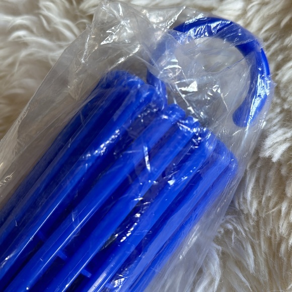 Bright blue hanging drying rack for clothes. Never opened. 17” long. Lightweight - Picture 5 of 7